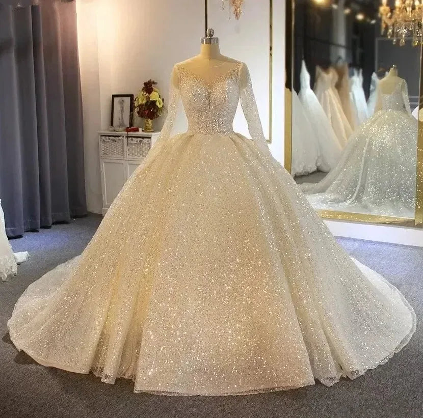 Customized 2026 new model Luxurious Sparkling Ball Gown Wedding Dresses Sheer Appliqued Sequins Long Sleeves Lace Bridal Gowns